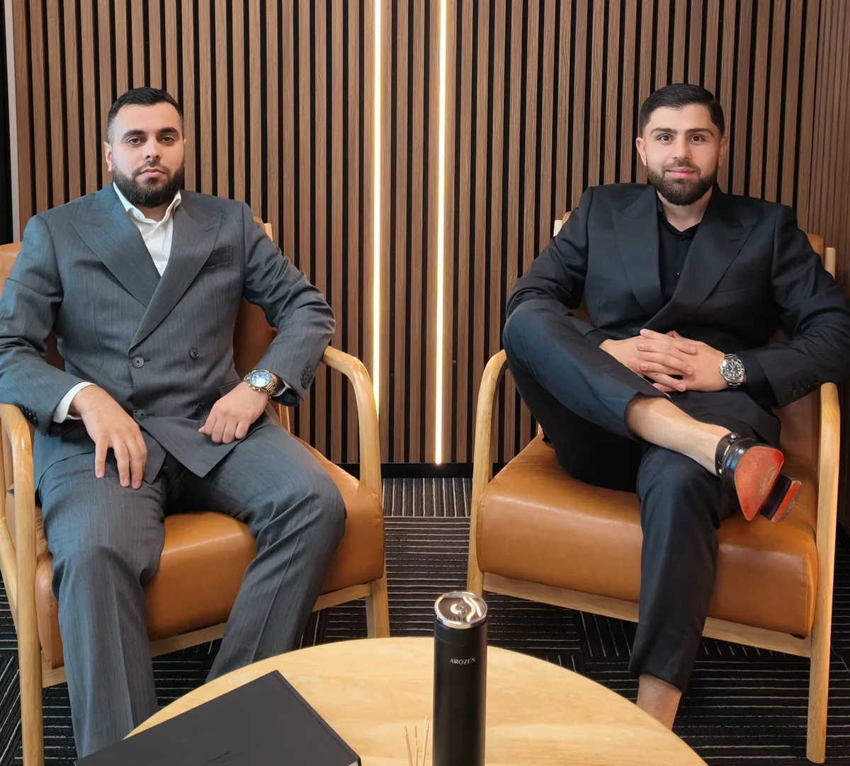 UCE Directors Bill Masri and Oudai Awad seated at the office